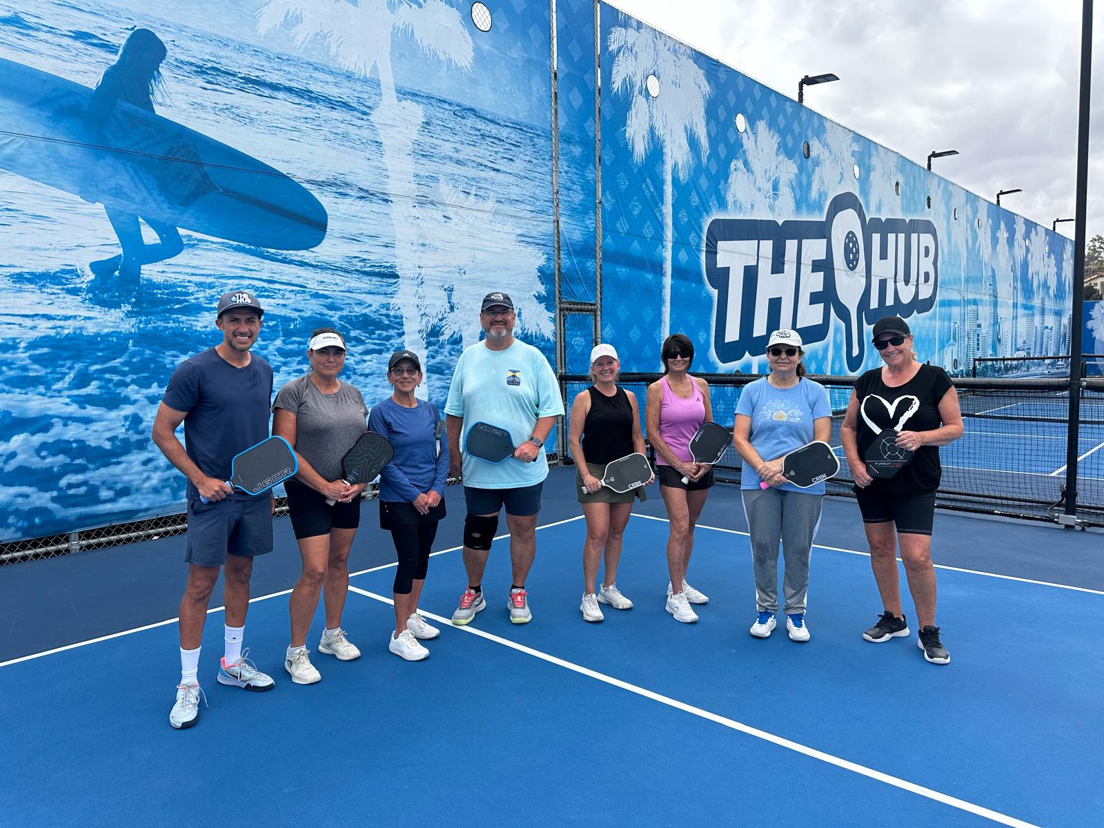 Players practicing pickleball